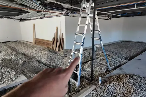 Commercial plumbing rough-in with exposed piping and drains for Tenant improvement plans in Prescott Valley, AZ