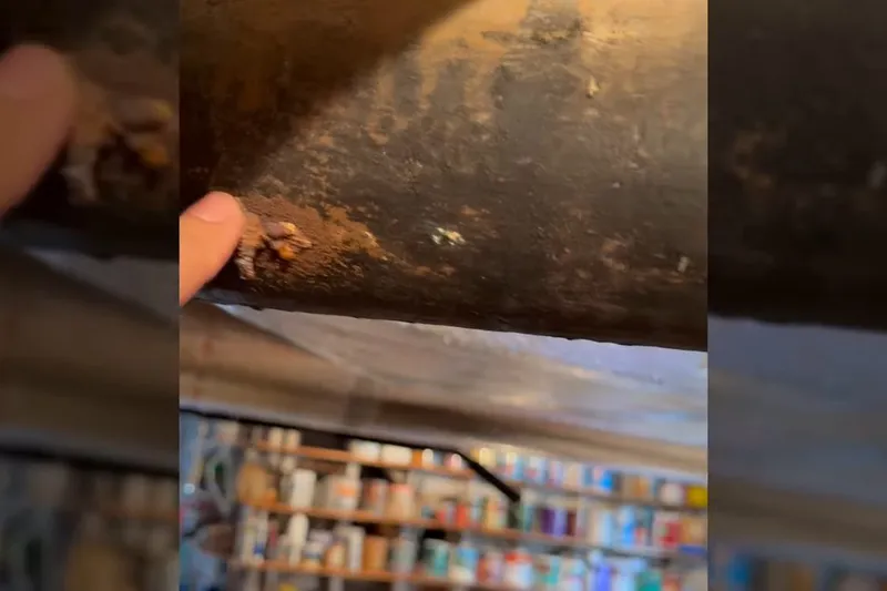 Corroded cast iron pipe section with rust buildup for Reach a Prescott Valley plumber any hour