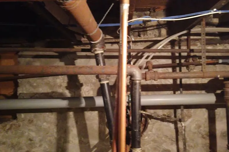 Crawl space plumbing pipe and drain connection for Buildup inside a pipe