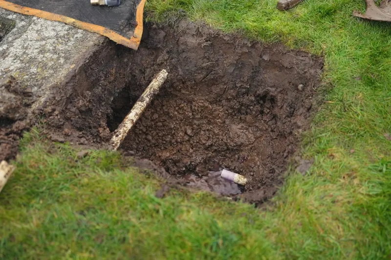 Exposed water service line with repair fittings installed for A wet spot from a line leak in Prescott Valley, AZ