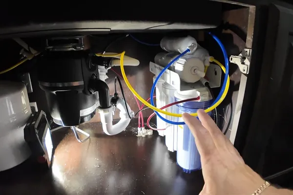 Garbage disposal unit wired below a kitchen sink for A dishwasher tie-in in Prescott Valley, AZ