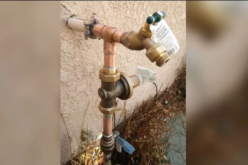 Outdoor faucet and exposed pipe connection being repaired for A frost-free sillcock in Prescott Valley, AZ