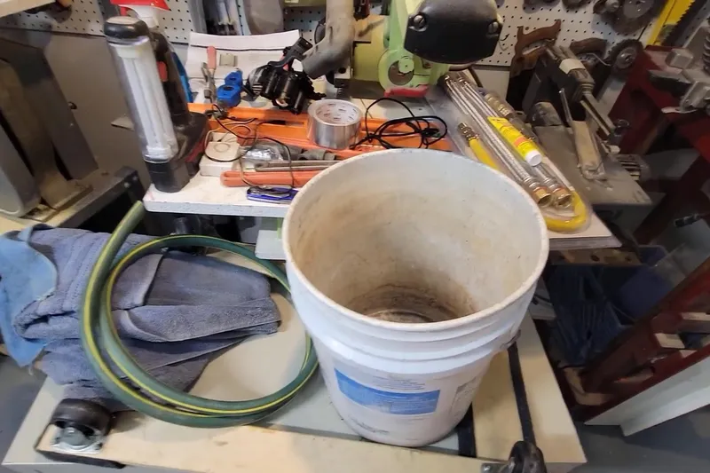Residential water heater with visible plumbing connections for A spring heater flush