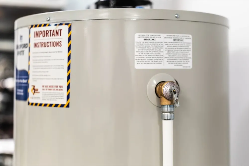 Residential water heater with visible plumbing connections for Water heater installation in Prescott Valley in Prescott Valley, AZ