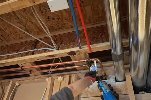 Sink faucet and under-sink drain connection being serviced for Winter in Prescott in Prescott, AZ