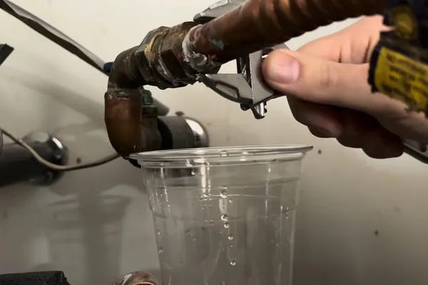 Water heater inlet hose and shutoff connection for Comparing tank sizes in Prescott Valley, AZ